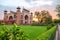 Taj Mahal`s western gate at sunrise, Agra, India