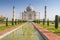 Taj Mahal tomb with reflection in the water in Agra, Uttar Pradesh, India