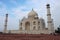 Taj Mahal is a white marble mausoleum on the bank of the Yamuna river in Agra city, Uttar Pradesh state - Image