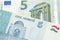 Tajik money close up with European money