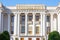 Tajik State Academic Ayni Opera and Ballet Theatre against the blue sky on a summer day