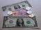 Tajikistan money somoni coins and US dollar banknote