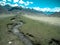 Tajikistan. Mountain stream flowing down from the barren peaks o
