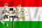 Tajikistani CCTV camera on the flag of Tajikistan Surveillance, security, control and totalitarianism concept