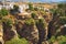 Tajo River gorge in Ronda white village. Andalusia, Spain.