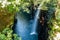 Takachiho Gorge cliffs and waterfall by the Gokase River, tourist attraction on Kyushu Island, Japan