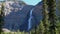 Takakkaw Falls Waterfall in a sunny summer day. Yoho National Park, Canadian Rockies, British Columbia.
