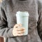 Take away coffee in reusable eco thermo mug. Social media content