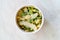 Take Away Healthy Organic Vegetable Food Sliced Artichoke with Broad Beans, Purslane Salad, Grated Parmesan Cheese and Olive Oil