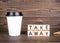 Take Away, wooden letters on desk. Coffee cup with copy space