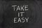 Take it easy phrase on blackboard