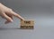 Take initiative symbol. Wooden blocks with words Take initiative. Beautiful grey background. Businessman hand. Business and Take