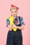 Take latex gloves on hand! Blonde young housewife taking on yellow latex gloves before cleaning. Pin-up modern style concept