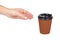 Take out coffee in thermo cup with hand. Isolated on a white background. Disposable container, hot beverage
