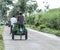 Take a pedicab, ride around the village