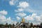 Take Photo beautiful buddish image call Luang Poo Tim and cloundy sky at Wat Lahan Rai.