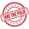 TAKE THE PULSE text on red grungy round rubber stamp