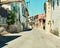 Take a tour through the streets of Greece. Shot of a street in an ancient, foreign city.