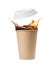 Takeaway paper cup with splashing coffee and plastic lid on white background