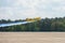 Takeoff of aerobatic aircraft and glider tug Akaflieg Munchen Mu30 Schlacro.