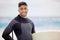 Taking care of my mind with a surf. Shot of a young man holding a surfboard at the beach.