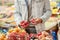 Taking fresh tomatoes at organic market