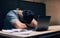 Taking a little brain break. a businessman taking a nap at his desk.