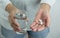 Taking medicine pills. Woman holds in hands the medicine pills a