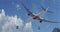 Taking off jet plane reflection on windows. Blue sky