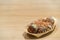 Takoyaki (octopus balls) on paper boat with clipping path, copy space on wood table background
