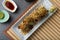 Takoyaki sushi roll flat lay view