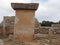 Talaiot de Trepuco megalithic t-shaped Taula monument in sunny day in Spain