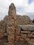 The Talaiotic village of Trepuco Minorca Balearic Islands showing a large megalith and taula in the background