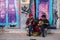 A talented couple of singing woman and man playing the bouzouki in the streets of Athens in Plaka