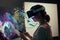 Talented Female Artist Wearing Augmented Reality Headset Working on Abstract Painting, Uses Paint Brush To Create New Concept Art