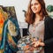 Talented female painter performing artwork studio