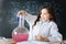 Talented little girl taking part in science experiment in the laboratory