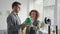 talented male and female couple in a lamp shade in their hands made on a 3D printer at home