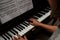 Talented woman playing the piano at home