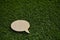 Talk bubble speech icon. Design elements on dark grass background