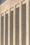 Tall blank columns of brutalist building