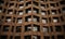 A tall brick building with lots of windows and brutalism zig zag hoog detail. AI generated