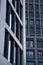 tall building apartment commercial cold brutalist glass concrete dark
