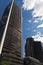 Tall downtown business buildings on a summer day