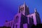 Tall downtown Los Angeles Catholic Church in twilight purple haze.