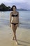 Tall girl in bikini at the beach
