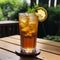 Tall glass of iced tea with lemon slice garnish