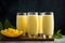 Tall glasses filled with a creamy mango lassi. Ai Generated.NO.02