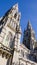 The tall Gothic spire of an Anglican church in Cork, Ireland. Neo-Gothic Christian architecture. Cathedral Church of St Fin Barre