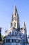 The tall Gothic spire of an Anglican church in Cork, Ireland. Neo-Gothic Christian religious architecture. Cathedral Church of St